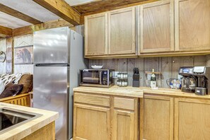 Fridge, microwave, coffee/tea maker, toaster