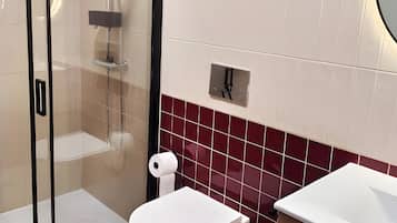 Ducha, secador de pelo, toallas