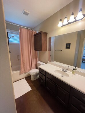 Hair dryer, towels, soap, toilet paper