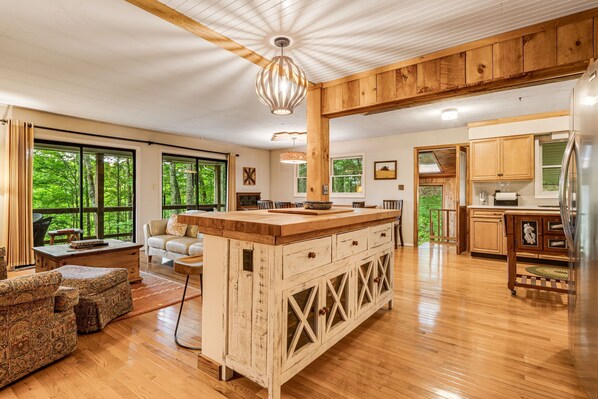 Smart TV, fireplace, table football, books