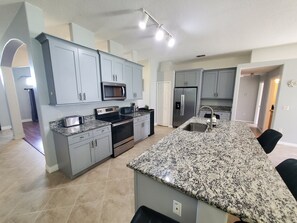 House, Multiple Beds, Patio, Garden View (Palm Paradise) | Private kitchen | Dining tables