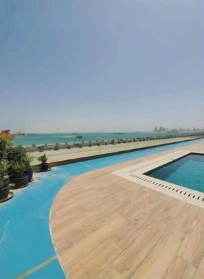 Pool - A Luxurious Sea View 1 Bedroom Apartment unit 3 (Al HIDD)