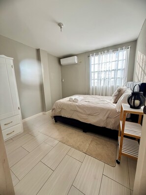 2 bedrooms, iron/ironing board, free WiFi, bed sheets - Quiet retreat 2-bedroom apartment with AC in charming Orange Valley, Couva (Orange Valley)