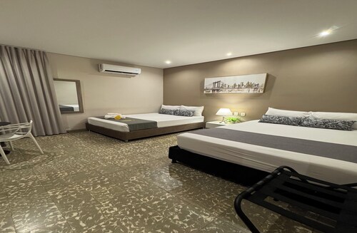 Cómoda habitación Twin en Manga cerca al Centro