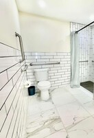 Shower, free toiletries, hair dryer, towels