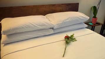 Premium bedding, down comforters, desk, laptop workspace