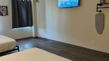 Premium bedding, down duvets, desk, laptop workspace