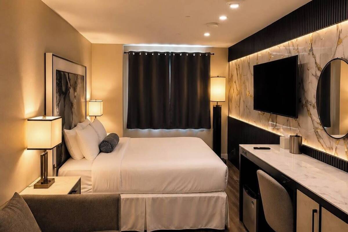 Premium bedding, down duvets, desk, laptop workspace