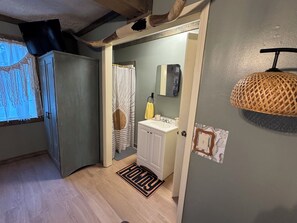 Shower, towels, soap, toilet paper