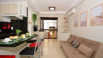 Apartamento | Área de estar | TV