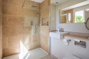 Shower, hair dryer, towels, soap