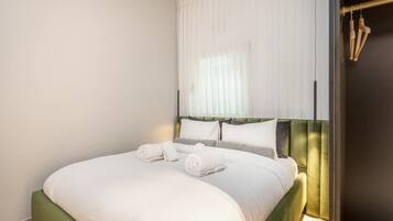 1 dormitorio, tabla de planchar con plancha, wifi gratis y ropa de cama