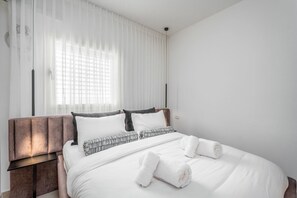 1 habitación, tabla de planchar con plancha, wifi gratis y ropa de cama 