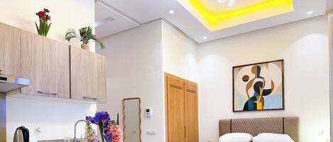 Monolocale Deluxe, vista giardino | Area soggiorno