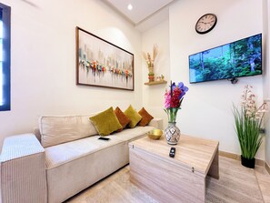 Estúdio luxo, vista para o jardim | Área de estar