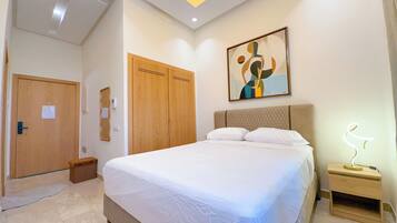 Studio Deluxe, quang cảnh vườn | Bàn ủi/dụng cụ ủi quần áo, truy cập Internet không dây miễn phí