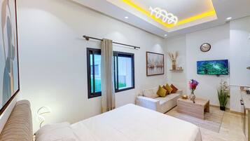 Deluxe Studio, Garden View | Iron/ironing board, free WiFi