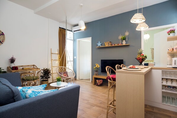 Apartment, City View | Living room | 55-inch Smart TV with digital channels, streaming services