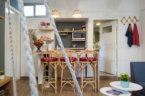 Apartment, City View | Private kitchenette | Mini-fridge, microwave, stovetop, electric kettle - Boho-Chic Cozy 2BR - Apt & Balcony in Mar Mikhael (Beirut)
