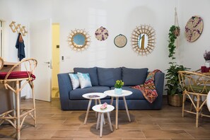Apartment, City View | Living room | 55-inch Smart TV with digital channels, streaming services