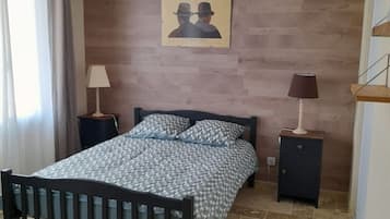 2 habitaciones, tabla de planchar con plancha y ropa de cama