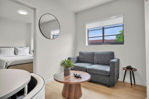 Superior Apartment, 2 Bedrooms | Living area | 43-inch Smart TV with digital channels, Netflix, streaming services