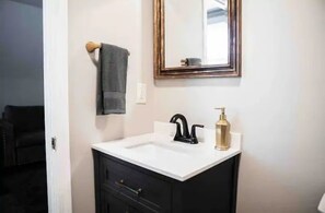 Hair dryer, towels, soap, shampoo