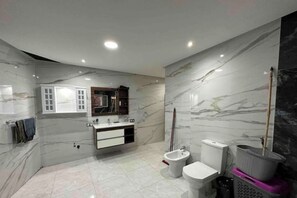 Shower, hair dryer, towels, soap