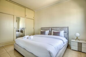 Apartment, 3 Bedrooms, Kitchen, City View | Blackout drapes, iron/ironing board, free WiFi