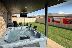 Terrace/patio - Raider Resort ~ Hot Tub, Arcade, and Luxury for 14 Guests in Red Raider Land (Lubbock)