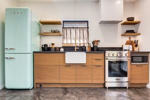 Signature Cabin, Ocean View | Private kitchen | Full-size fridge, microwave, oven, stovetop