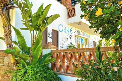 Spacious terrace, pool and access to the sea.