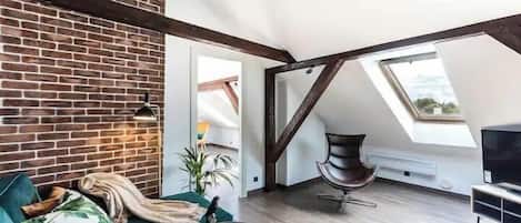 Apartamento, Aire acondicionado, vistas a la ciudad | Zona de estar