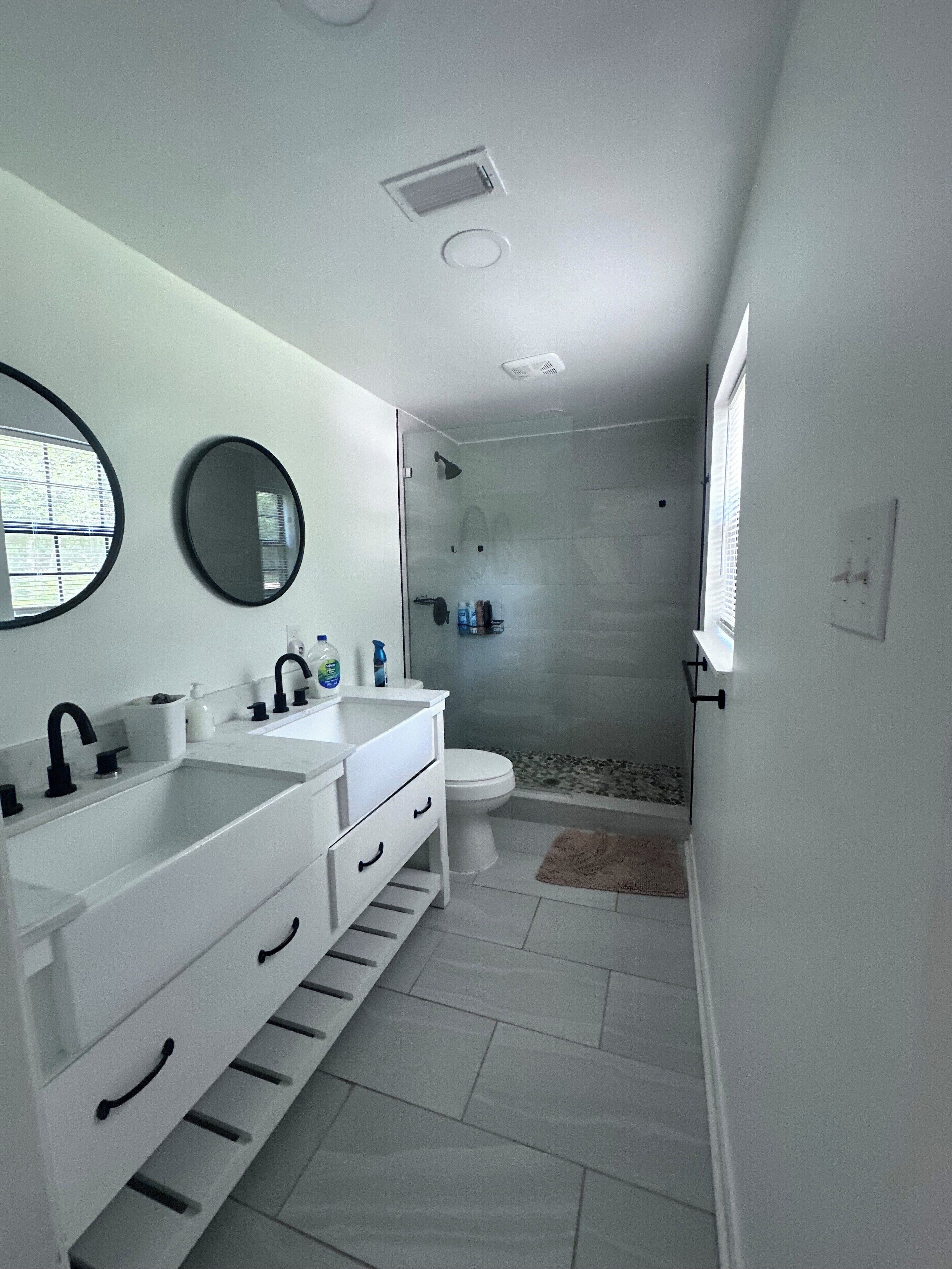 Shower, towels, soap, toilet paper