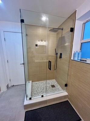 Shower, hair dryer, towels, soap