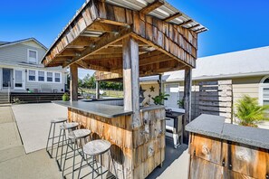 An outdoor wooden bar area with stools and a counter, surrounded by a fence and a house in the background. - 5 Mi to Dtwn Somerset! Country Retreat w/ Gazebo (Somerset)