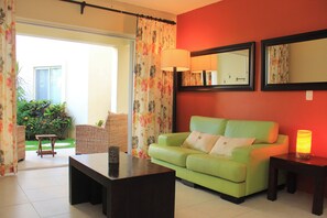 Comfort Apartment | Living room | 50-inch flat-screen TV with cable channels