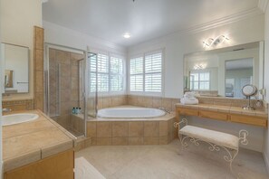 Shower, jetted tub, hair dryer, towels