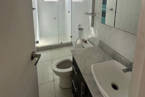 Hair dryer, towels, soap, toilet paper