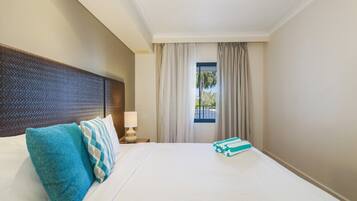 1 bedroom, desk, iron/ironing board, travel crib