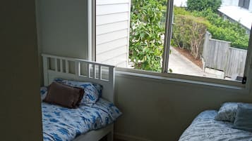 2 habitaciones y ropa de cama