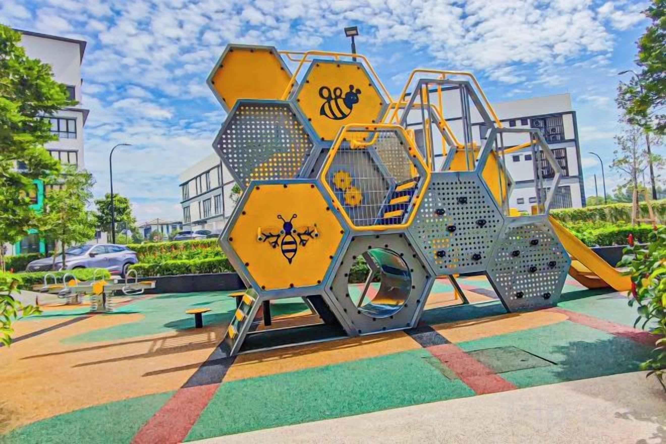 A playground with hexagonal structures and a slide.