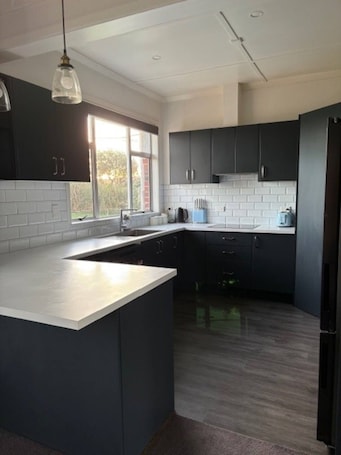Fridge, microwave, oven, stovetop. Beach Valley Air B & B