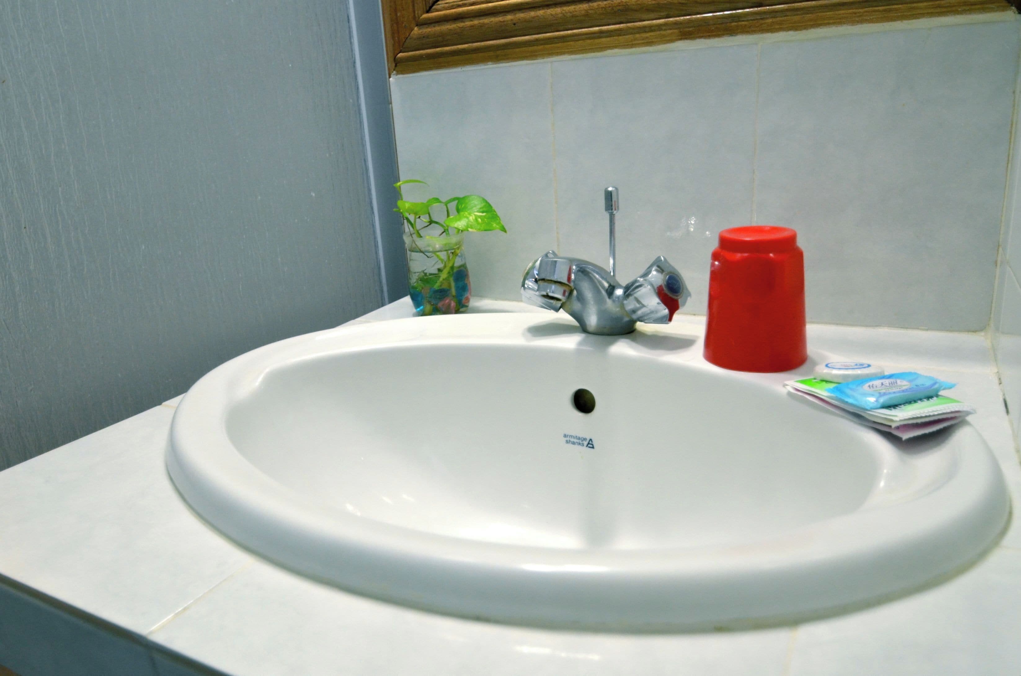 Shower, hair dryer, slippers, soap