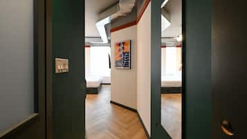 Deluxe Room, City View | In-room safe, desk, laptop workspace, blackout drapes