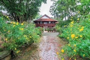 Panoramic Chalet, Courtyard View | Pillow-top beds, in-room safe, desk, blackout curtains - Lumiere Family Village Ba Vi (Hanoi)
