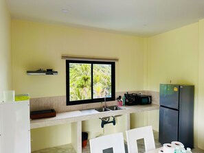 Family Penthouse, Mountain View | Private kitchenette | Fridge, electric kettle - M&N Guesthouse Kata (Karon)