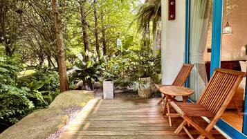 Deluxe Quadruple Room, Balcony, Garden View | Terrace/patio