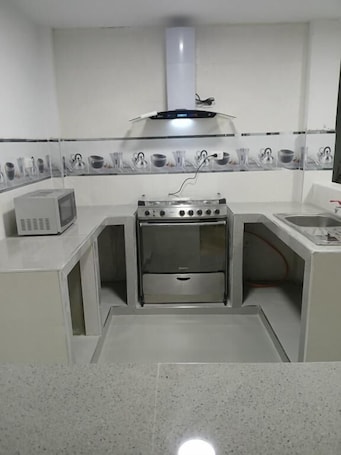 Cozinha privada. Hotel magu huarmey