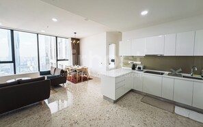 Deluxe Condo, Kitchen, City View | Private kitchen